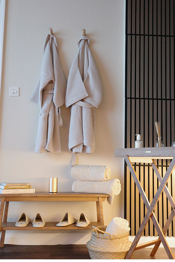 Sauna relaxation room with robes